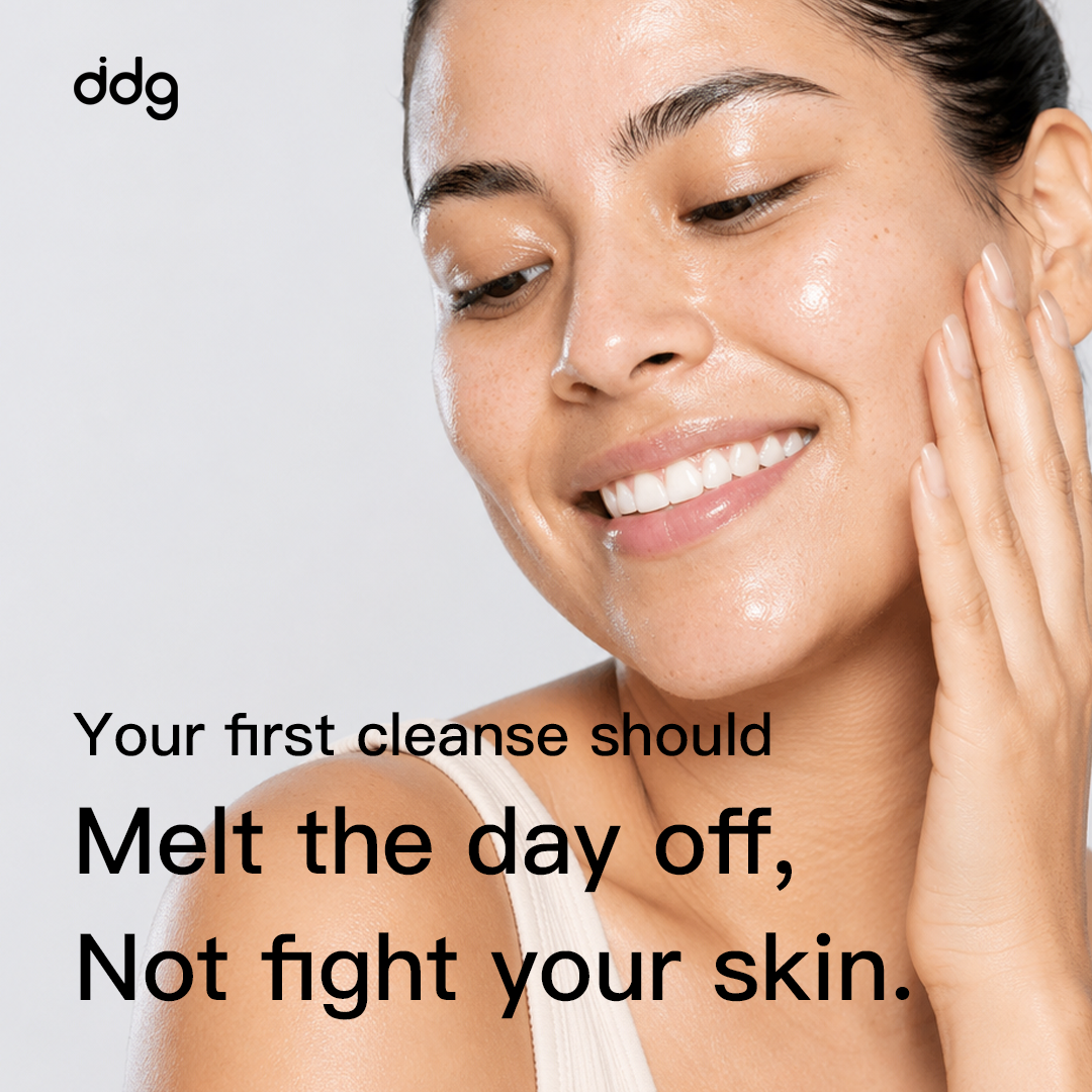 Woman massaging ddg cleansing balm onto her face